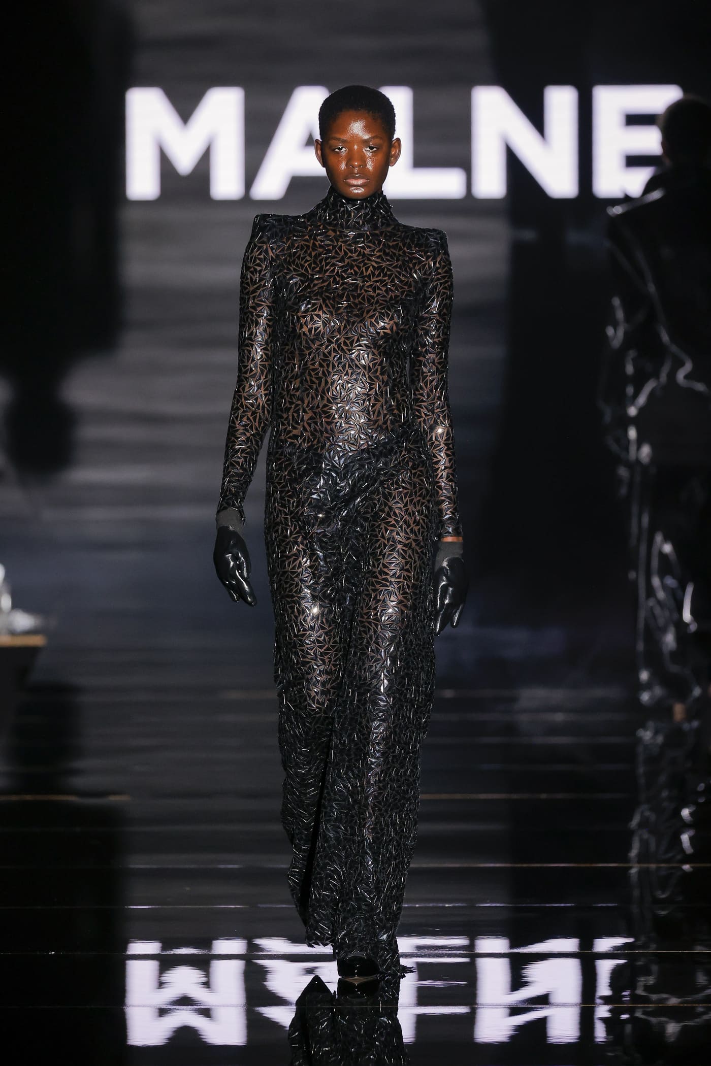 catwalk model in neutral black wardrobe
