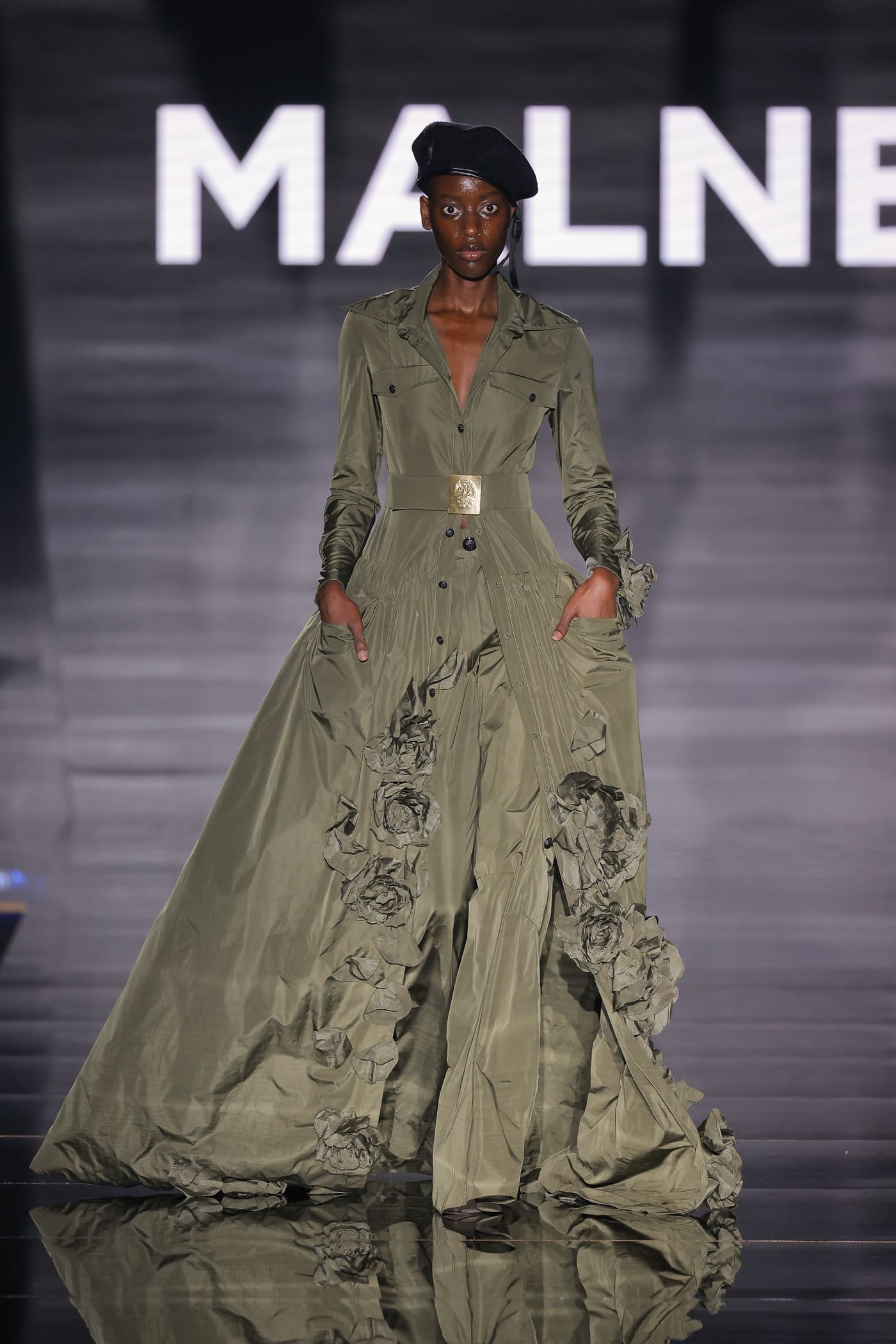 catwalk model in military green dress