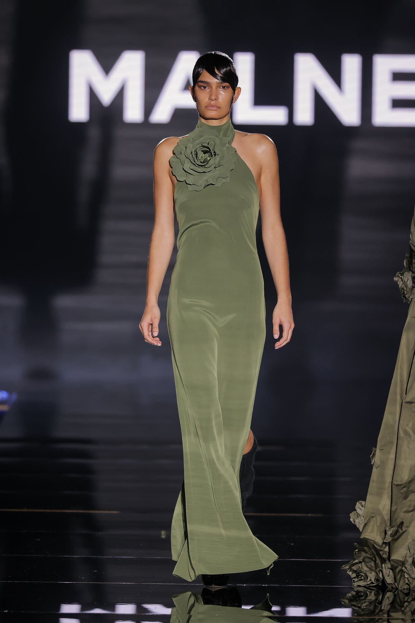 catwalk model skin-tight military green dress