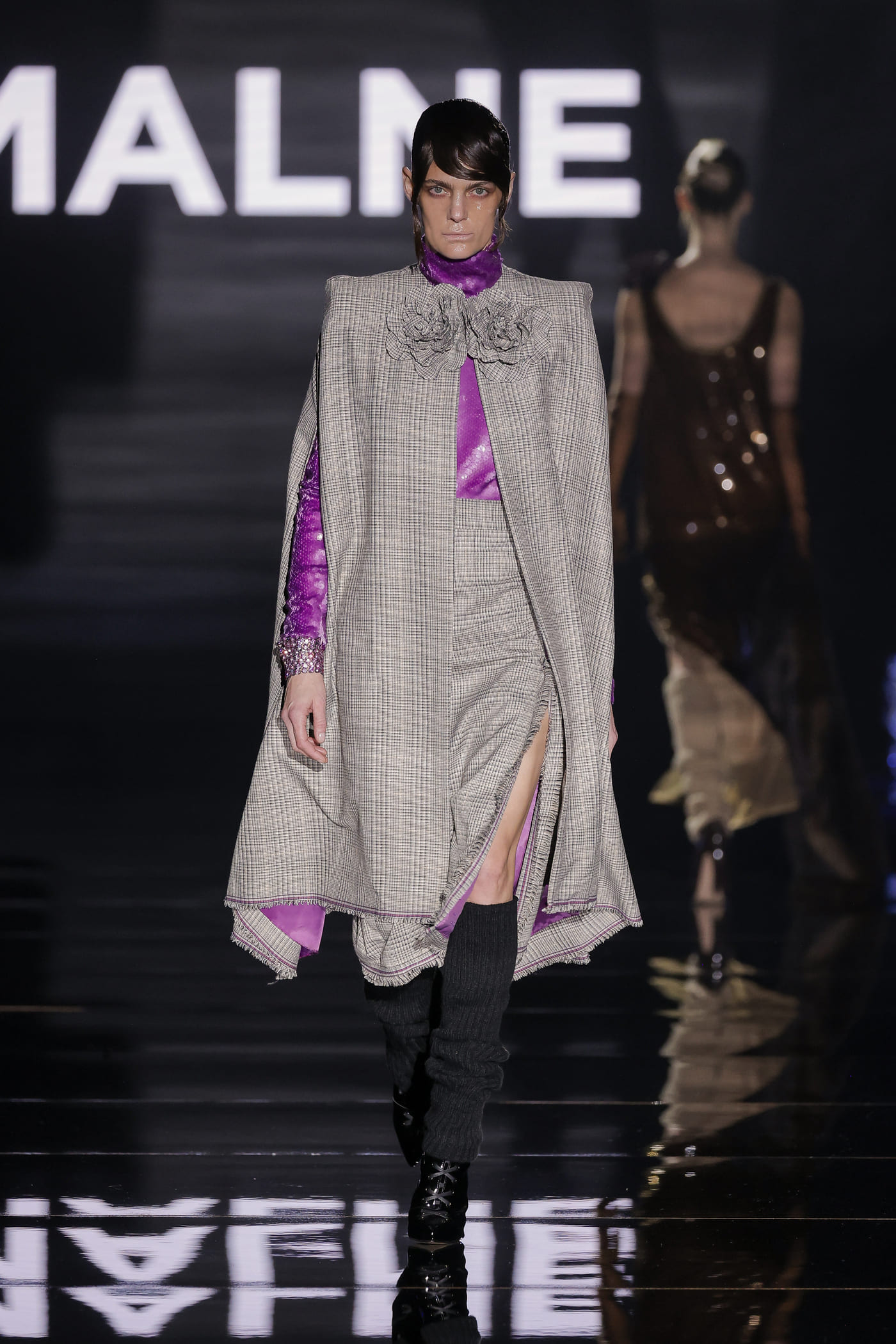 catwalk model with striped costumes