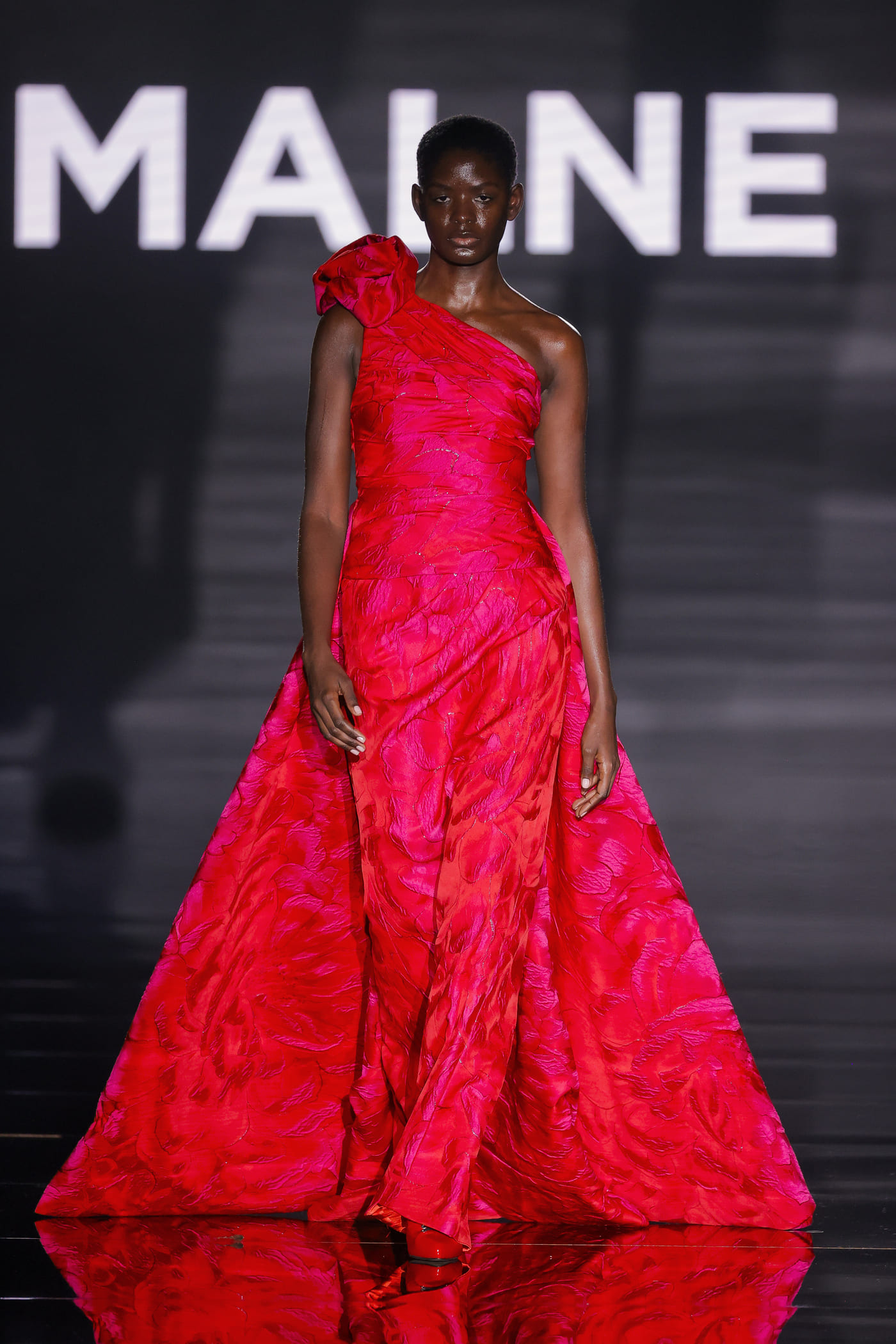 red with pink flowers catwalk model