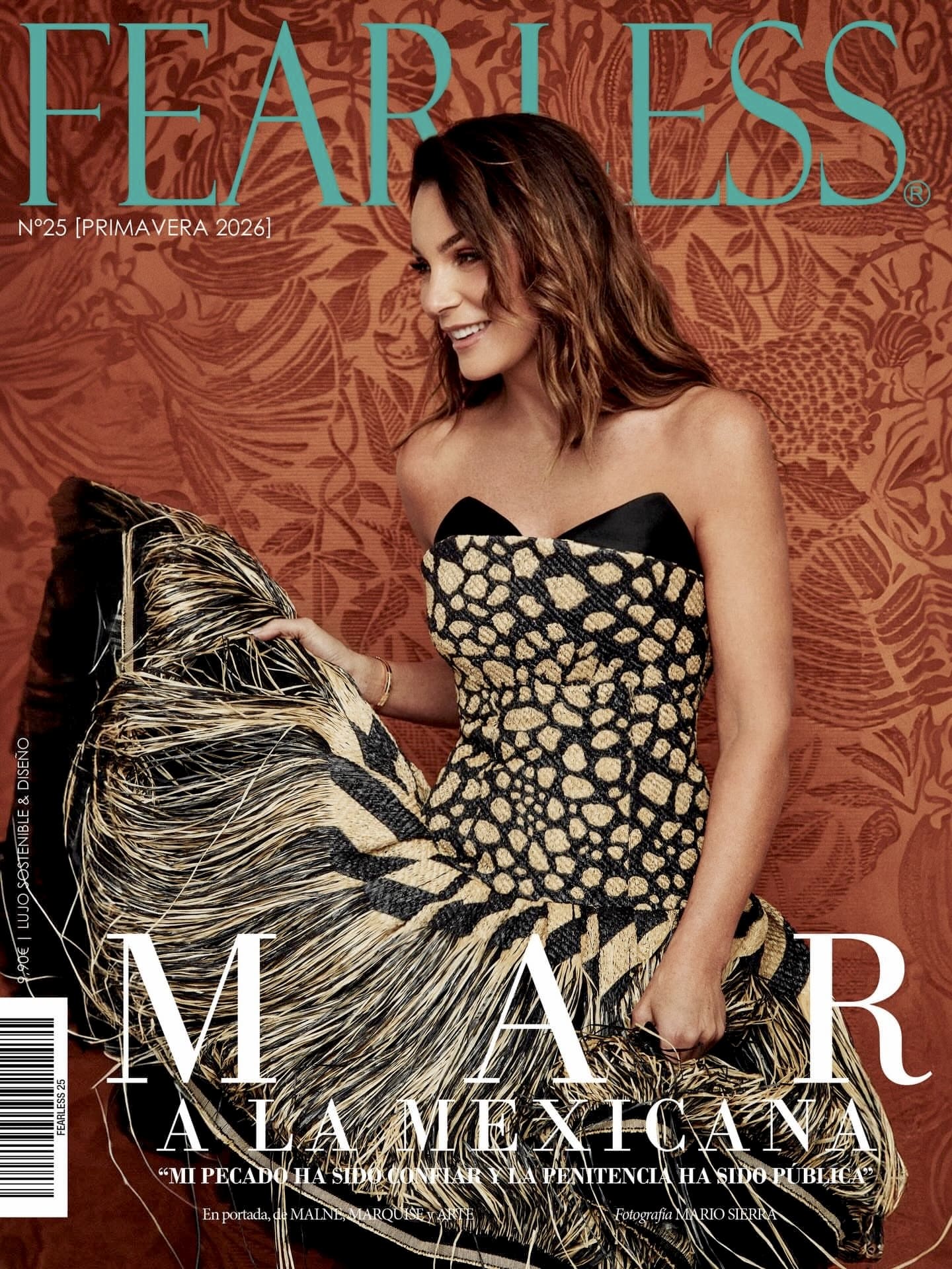 Cover of "FEARLESS" magazine featuring a woman wearing a dress by Malne